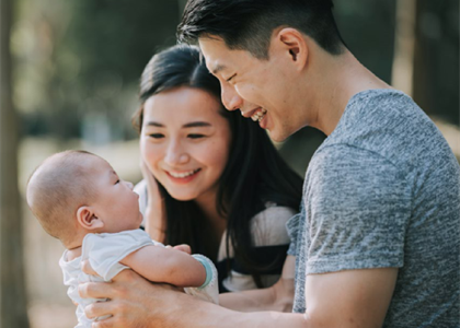 Couple with newborn infant